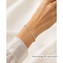 Brillant-Tennisarmband aus 333 Gelbgold mit zweifarbigen Fassungen aus Gelb- und Weißgold