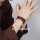 Mehrreihiges Kunstlederarmband mit Edelstahl-Elementen und Magnetverschluss